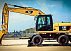 Колесный экскаватор CAT [M320] 1.19м³