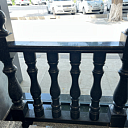 Полированные круглые тумбы из Black Diamond гранита