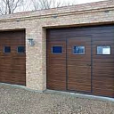 Гаражные секционные ворота с калиткой серии PRESTIGE